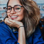 Girl with Glasses Smiling